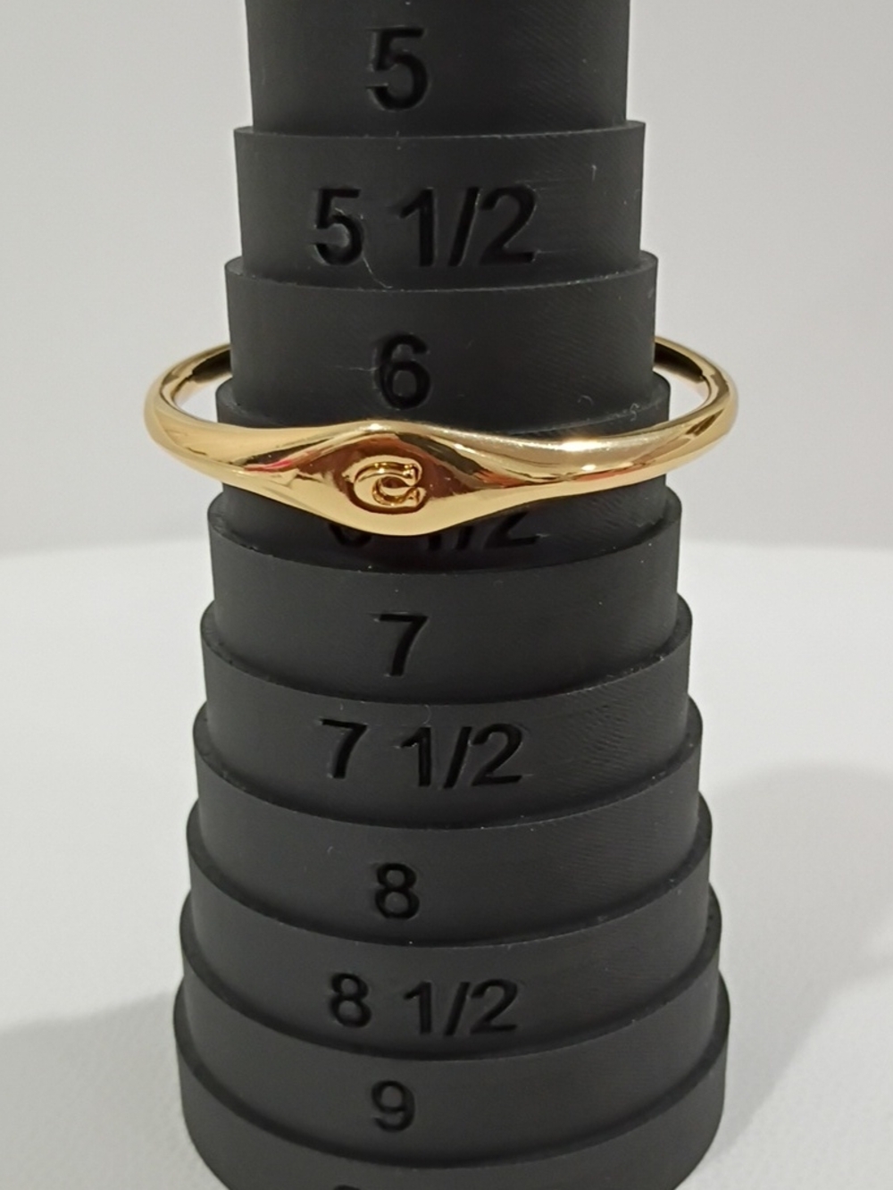 Coach Gold-Tone Swirl Bracelet